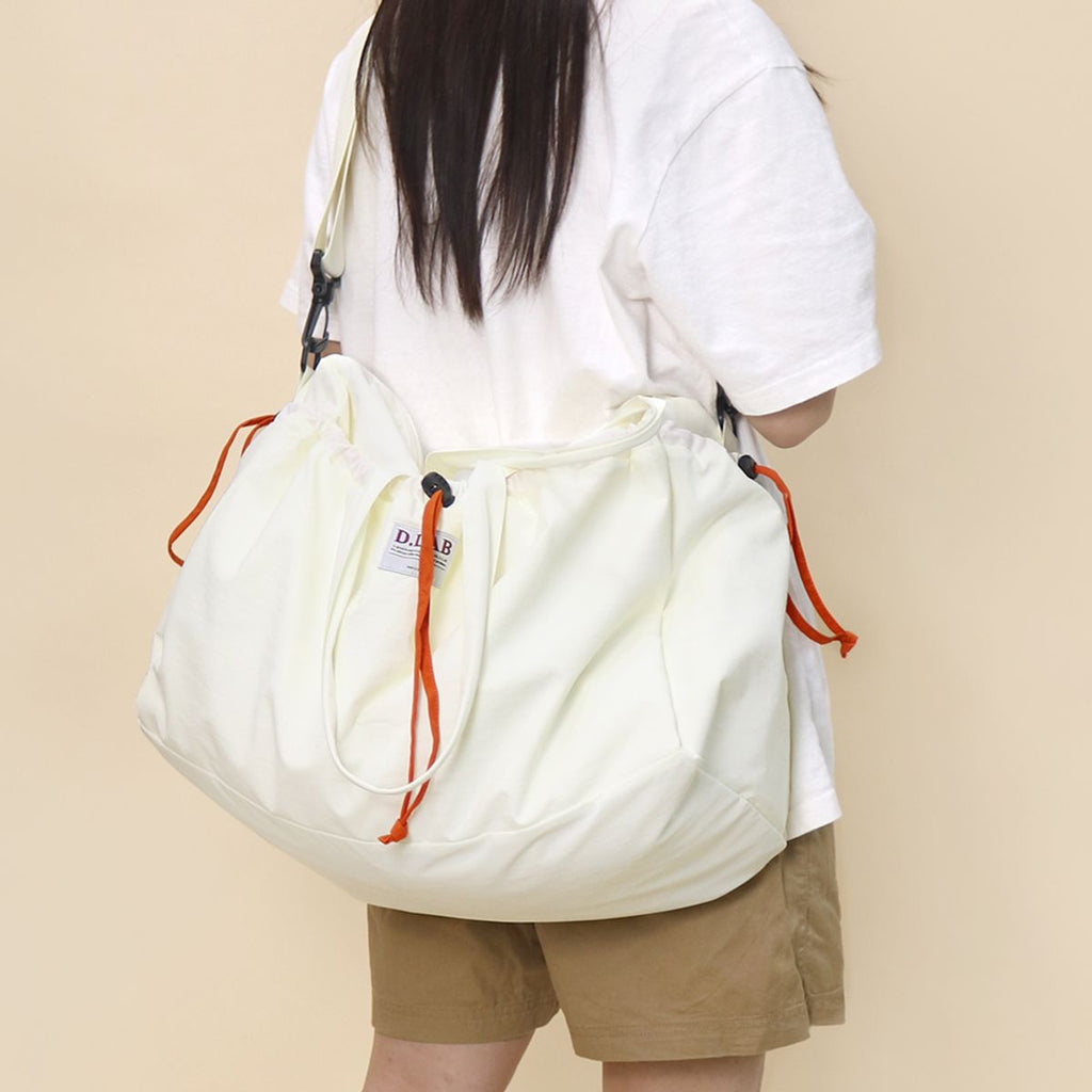 D.LAB(ディラップ) ストリングポケットボストントラベルバッグの特徴と選び方(IVORY・SKU:5004744349)