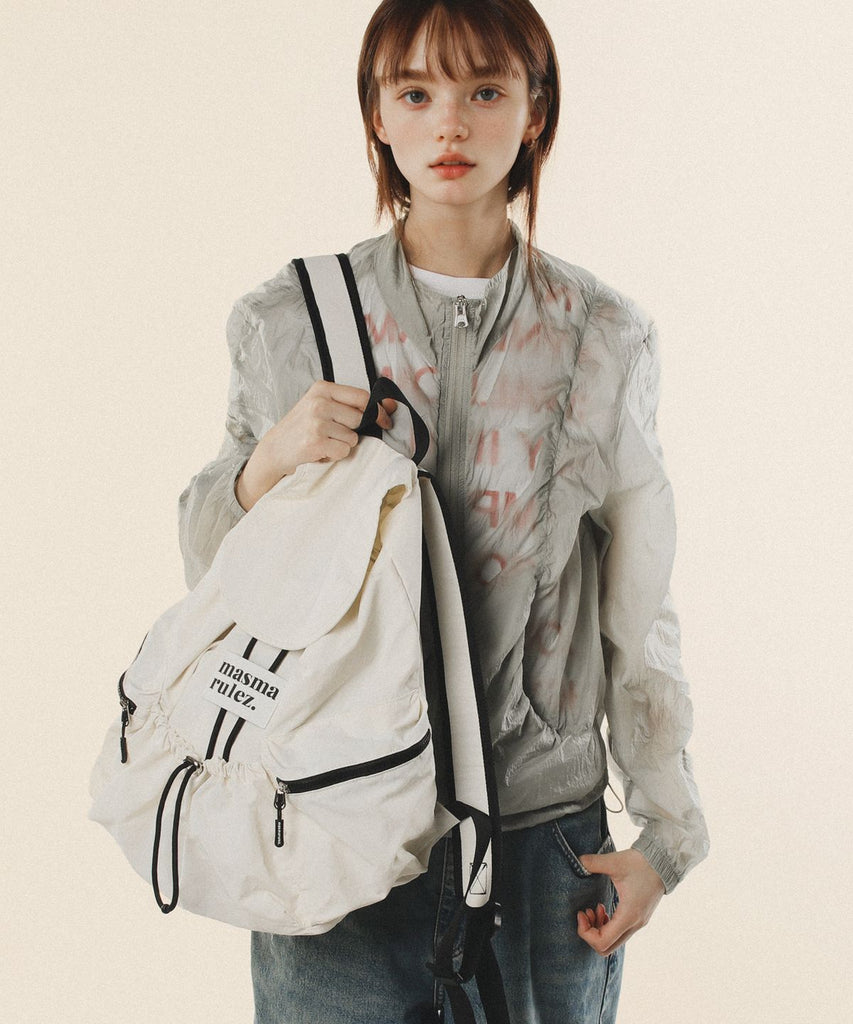 MASMARULEZ(マスマルルス)String Flap Backpack — Ivoryの特徴と選び方ガイド
